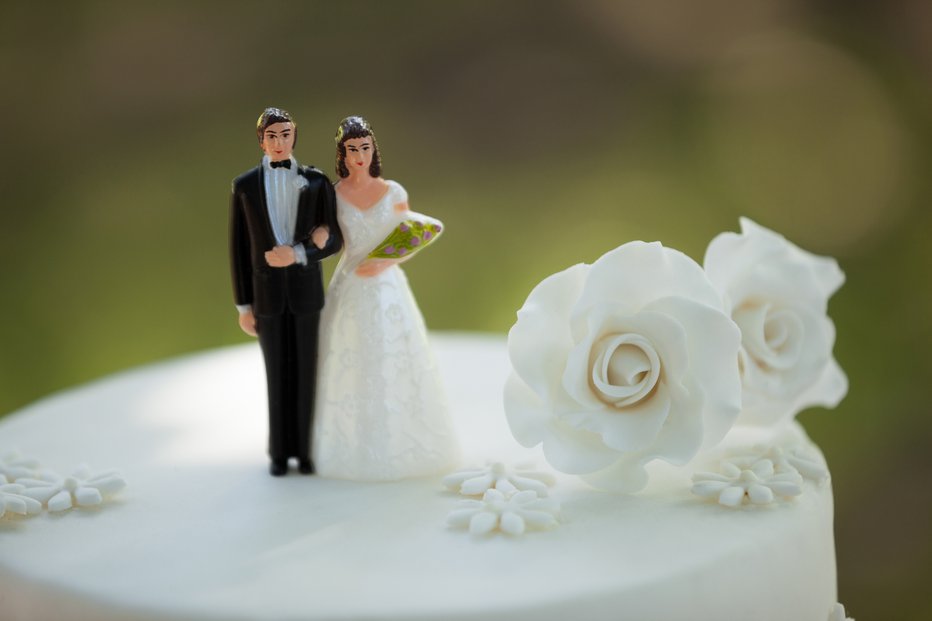 Fotografija: Poročna torta, poroka. FOTO: Wavebreakmedia Ltd, Getty Images