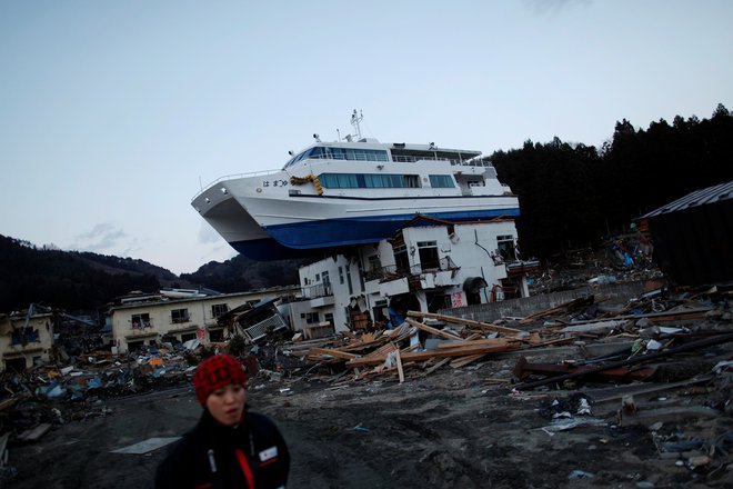 Katastrofa je vzela več kot 18.000 življenj in povzročila gromozansko škodo. FOTO: Damir Sagolj/Reuters