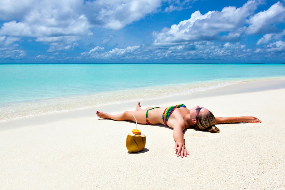 Fotografija: Po službi se prileže odmor na plaži. FOTO: Kaliostro, Getty Images, Istockphoto