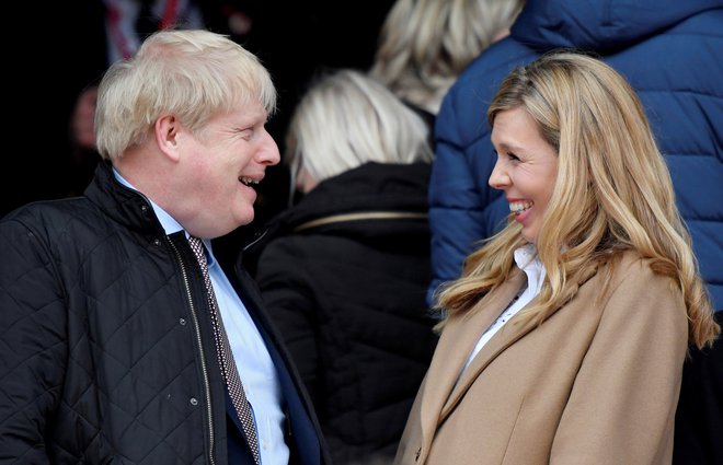 Boris Johnson in Carrie Symonds. FOTO: Henry Nicholls, Reuters