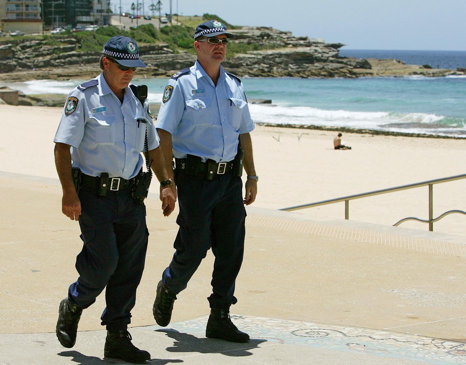 Fotografija: Naslednja dva tedna morajo avstralske plaže samevati. FOTO: Will Burgess/Reuters