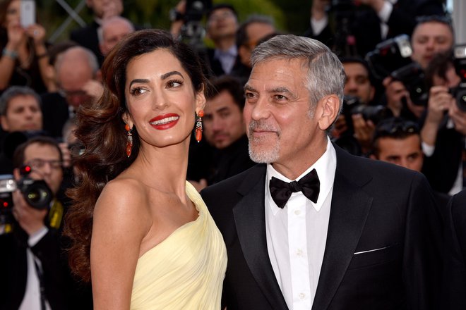 George Clooney bo najverjetneje v družbi žene Amal. FOTO: Clemens Bilan/Getty Images