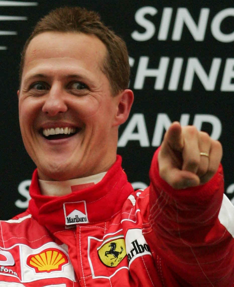 Fotografija: Oboževalci upajo, da bodo še kdaj videli tako nasmejanega Schumacherja. FOTO: Aly Song, Reuters