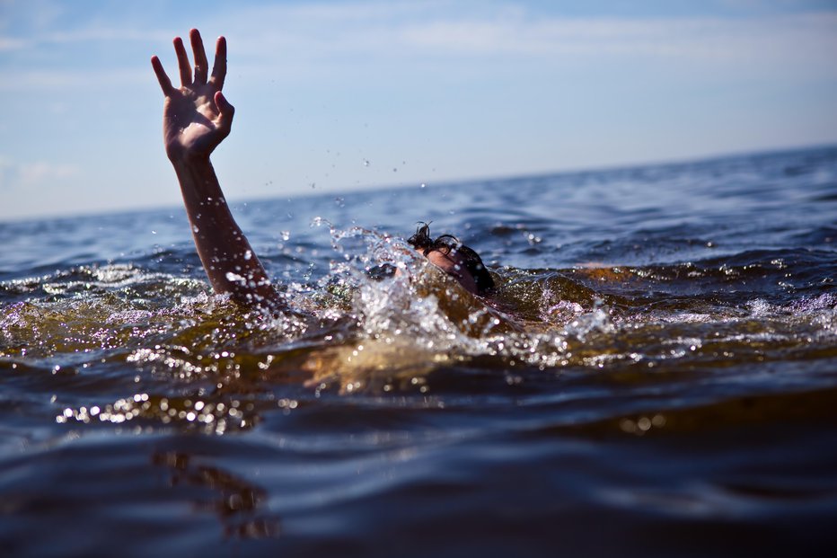 Fotografija: Nihče izmed štiričlanske družine ni znal plavati. FOTO: Anton Sokolov/Getty Images