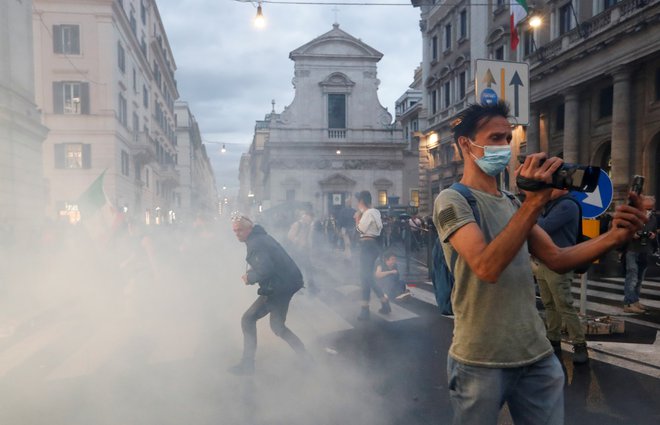 Protesti provi covidnemu potrdilu.FOTO: Remo Casilli Reuters