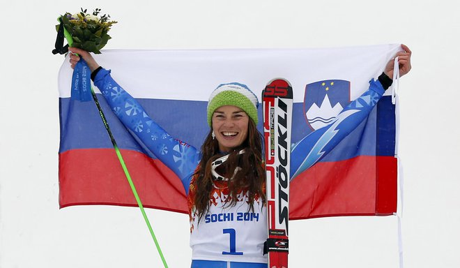 V številnih trenutkih kariere je Tina Maze ponosno predstavljala slovenske barve. Ta je iz Sočija 2014, kjer je postala olimpijska prvakinja v smuku in veleslalomu. FOTO: Matej Družnik, Delo
