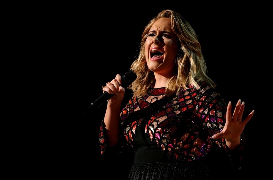 Fotografija: Adele na nastopih v Las Vegasu noče necepljenih oboževalcev. FOTO: Lucy Nicholson, Reuters
