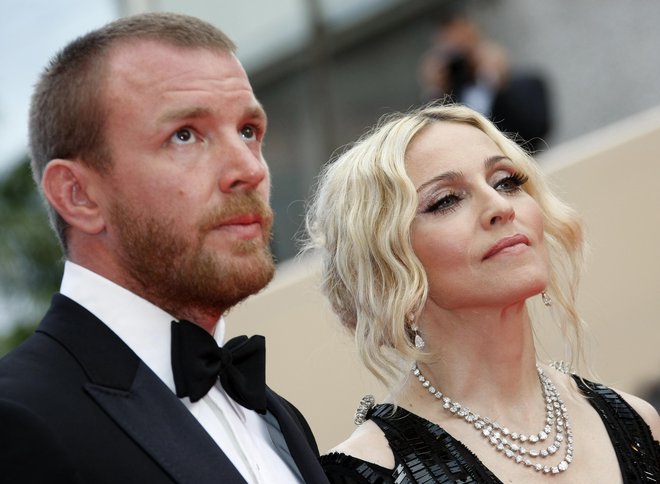 Madonna in Guy Ritchie sta se ločila leta 2008. FOTO: REUTERS/Eric Gaillard
