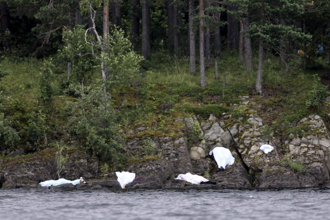 Na Utøyi je ubil 69 ljudi, po večini mladostnikov. FOTO: Fabrizio Bensch/Reuters
