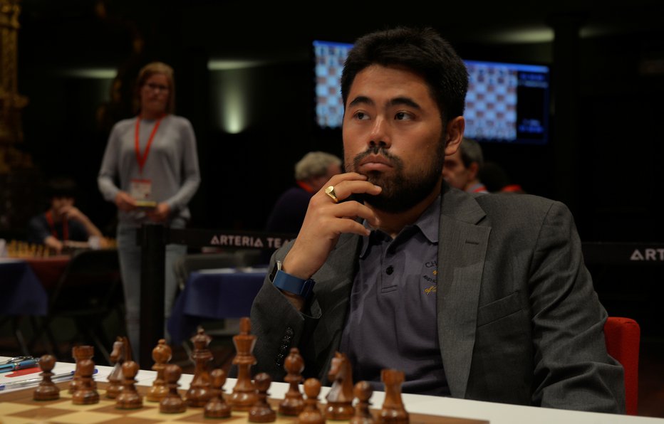 Fotografija: Hikaru Nakamura se je zmagovito vrnil za prave šahovnice. FOTO: Vincent West/Reuters
