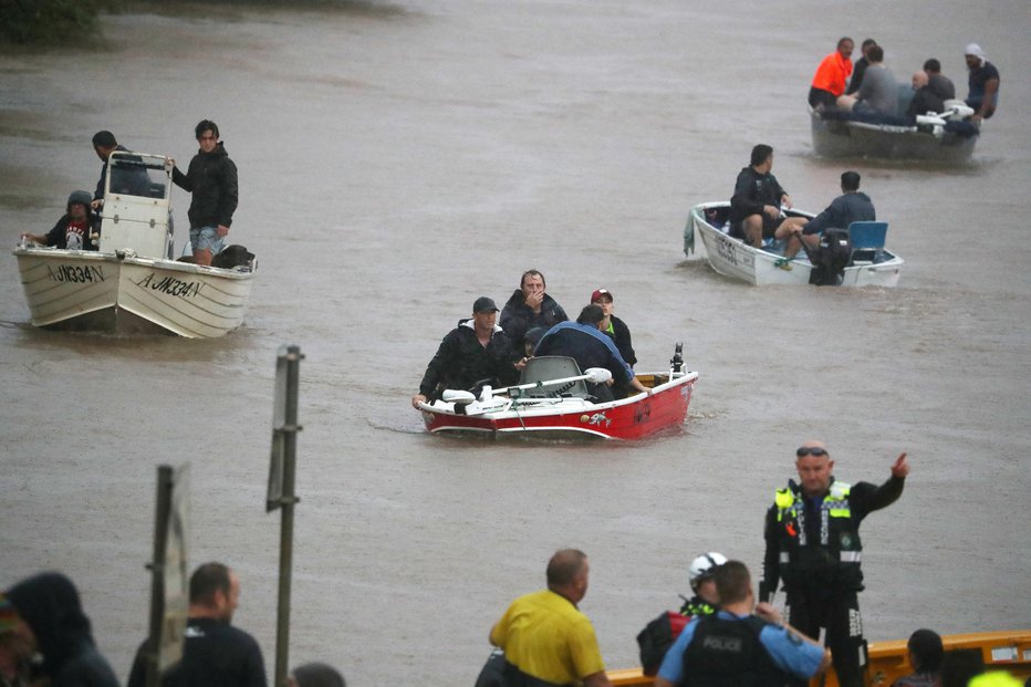 Fotografija: Številna mesta so poplavljena. FOTO: Reuters
