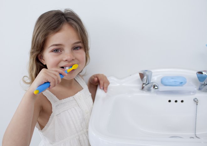 Otroke naučimo dosledne higiene. FOTO: Wavebreakmedia Ltd/Getty Images

