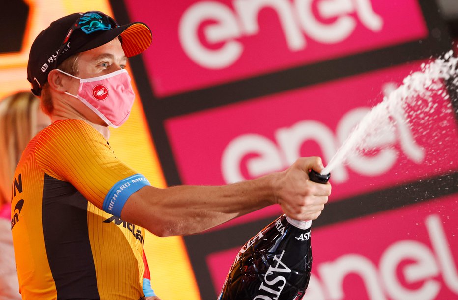 Fotografija: Jan Tratnik se je lani veselil zmage v 16. etapi Gira.
FOTO: Luca Bettini/AFP