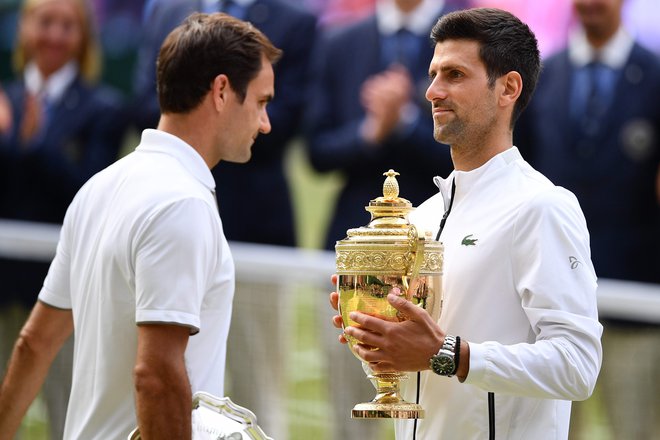 Predlani sta Federer in Đoković uprizorila dih jemajoč finale v Wimbledonu. FOTO: Daniel Leal-olivas/AFP
