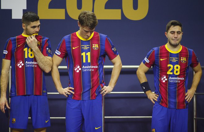 Blaž Janc in Jure Dolenec nista mogla verjeti, da je Barcelona tako slabo odigrala finale. FOTO: Thilo Schmuelgen/Reuters