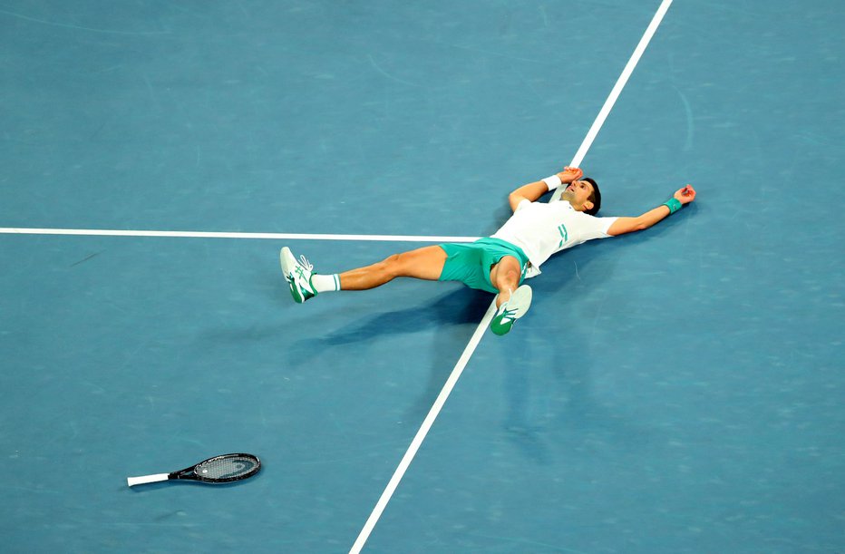Fotografija: Novak Đoković je devetič osvojil OP Avstralije. FOTO:
Kelly Defina/Reuters
