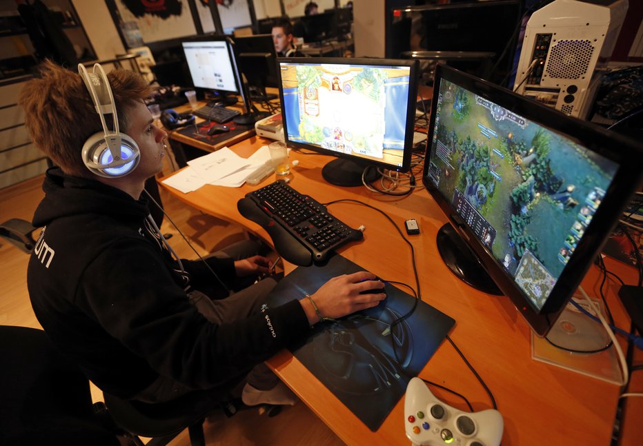 Fotografija: Tekmovanje v računalniških igricah je že pred leti postal tudi profesionalni šport.

Foto: Jean-Paul Pelissier/REUTERS
