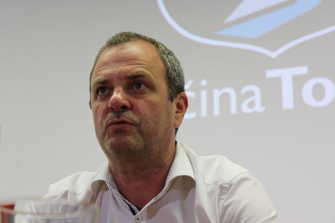 Župan Občine Tolmin Uroš Brežan in kandidat za ministra. FOTO: Blaž Močnik
