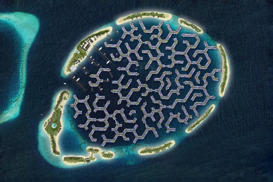 Fotografija: Plavajoče mesto, zasnovano v obliki možganov, obdajajo koralni grebeni.
