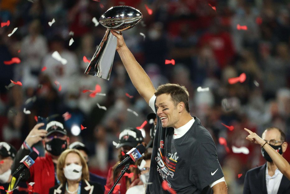 Fotografija: Tom Brady ostaja kralj med podajalci v NFL. FOTO: Patrick Smith/AFP
