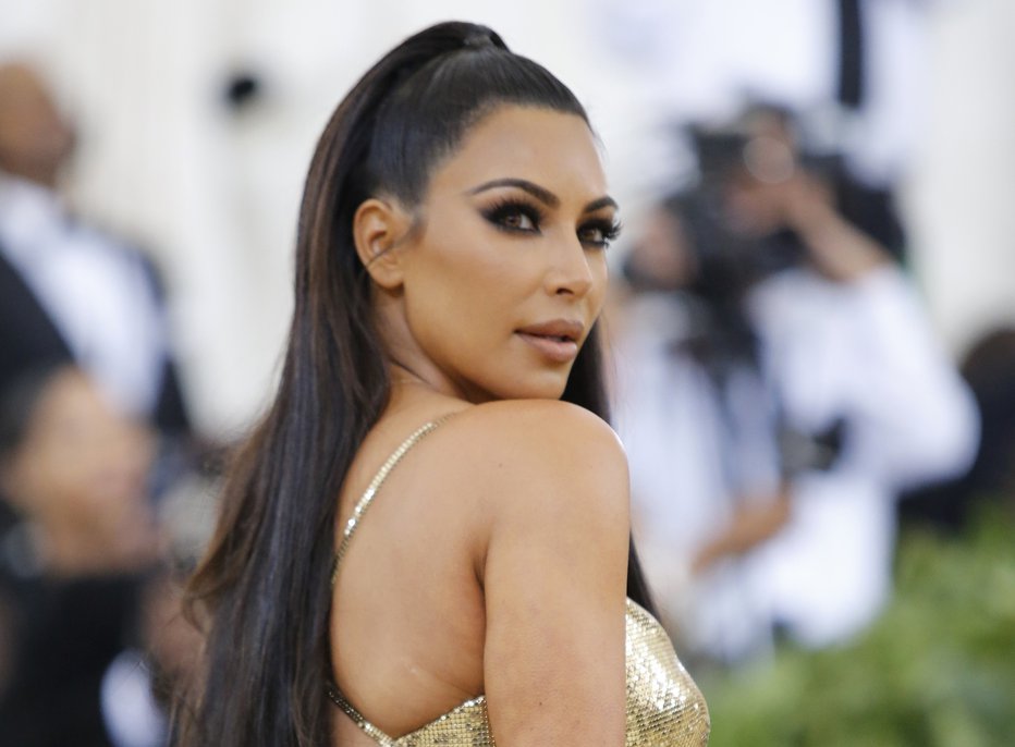 Fotografija: Zadnjica Kim Kardashian: objekt poželenja uporabnic estetske kirurgije. FOTO: Reuters

