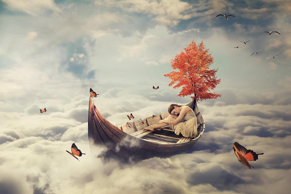 Fotografija: Young lonely beautiful woman drifting on a boat above clouds. Dreamy screensaver with skyline background