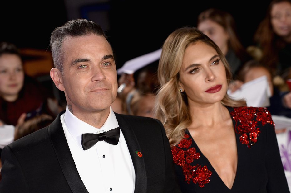 Fotografija: Robbie Williams in Ayda Field. FOTO: Jeff Spicer, Getty Images
