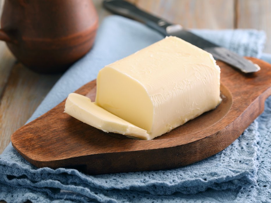 Fotografija: Tudi pri maslu lahko privarčujemo, do 44 evrov na leto. FOTO: Getty Images
