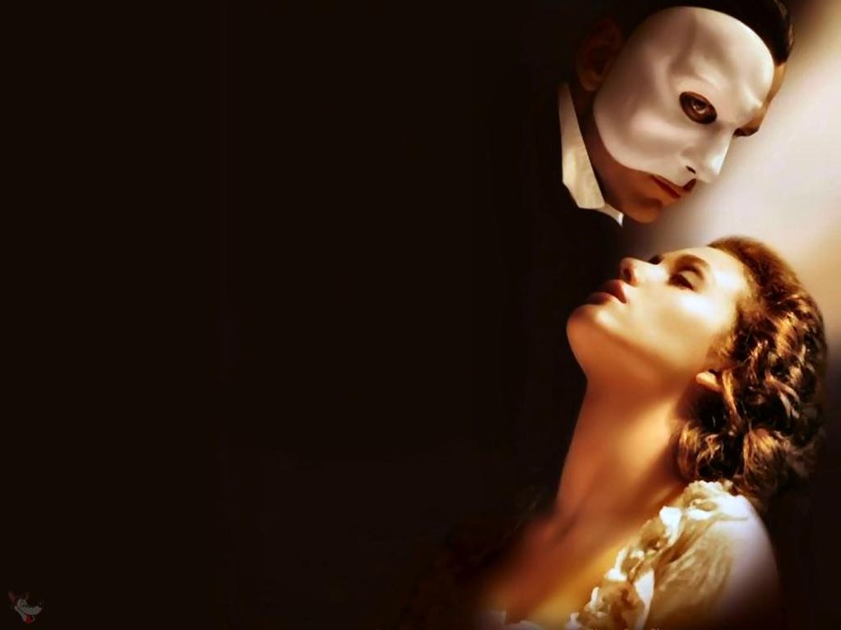 Fotografija: Gerard Butler kot Fantom in Emmy Rossum kot Kristina v filmu Fantom iz opere iz 2004.
