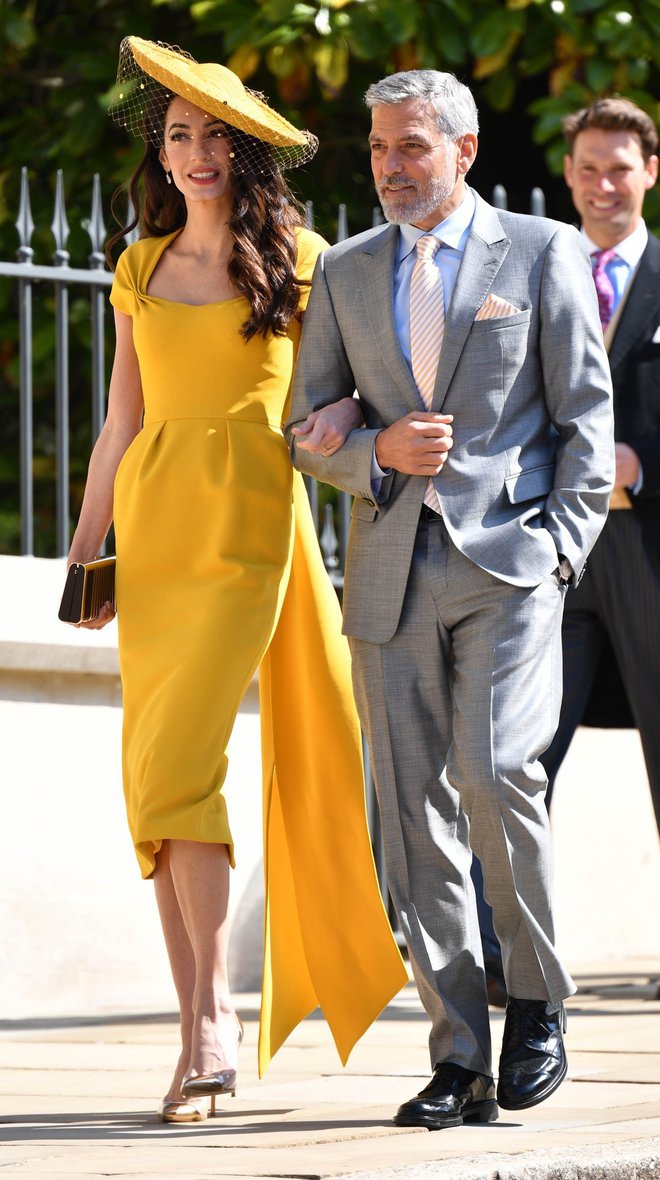 Bila sta tudi med hollywoodskimi izbranci na poroki princa Harryja in Meghan Markle, kjer je Amal navdušila z rumeno obleko Stelle McCartney.
