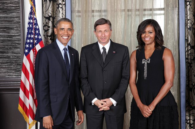Borut Pahor z Barackom in Michelle Obama. FOTO: Uprs
