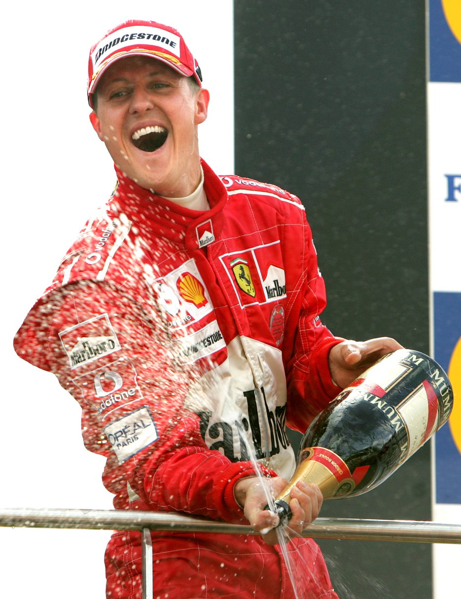 Fotografija: Michael Schumacher, kot se ga spomnijo njegovi oboževalci. FOTO: Francois Lenoir/Reuters
