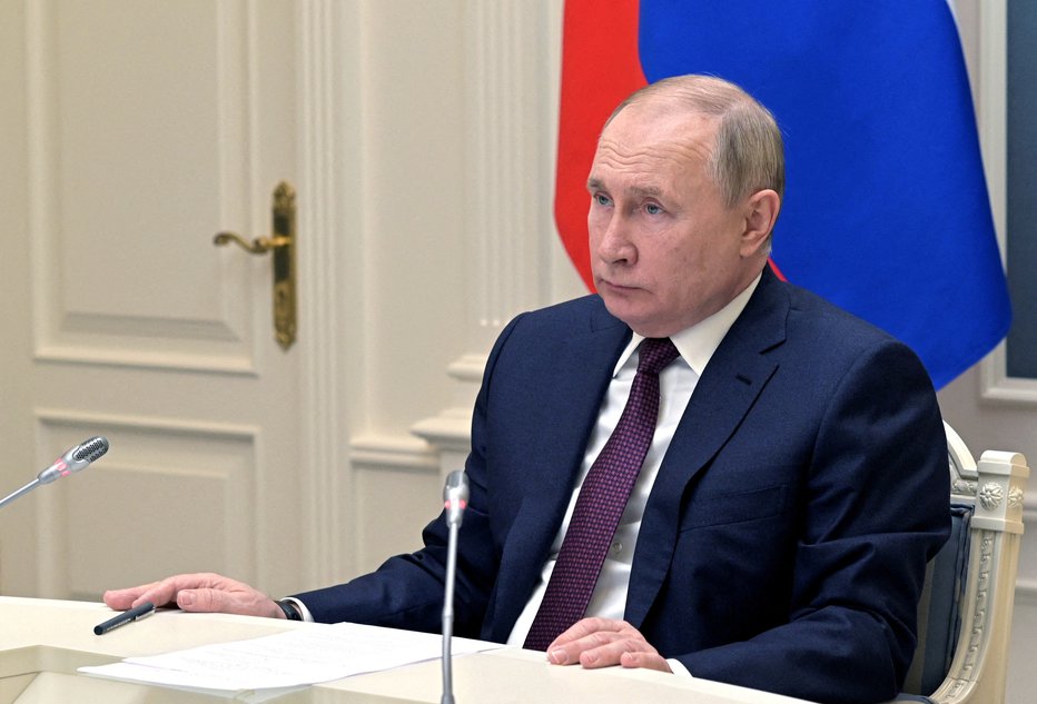 Fotografija: Putin je s ponovnim podpisom danes zaključil formalni postopek priključitve. FOTO: Sputnik Via Reuters
