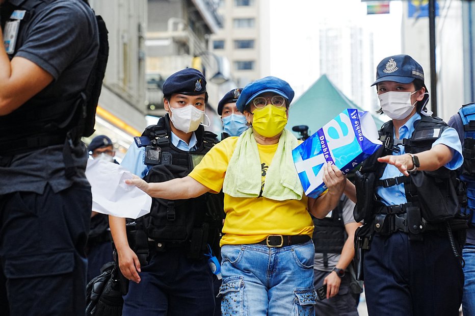Fotografija: Prežijo na disidente, denimo ob obletnici pokola na trgu Tienanmen. FOTO: Lam Yik, Reuters
