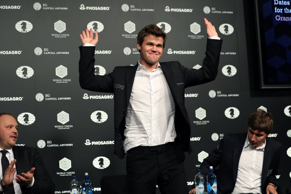 Fotografija: Magnus Carlsen si je že zagotovil skupno zmago. FOTO: Mark Kauzlarich/Reuters
