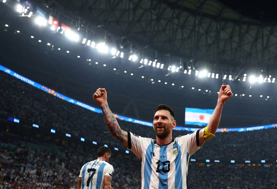 Fotografija: Takole je Lionel Messi proslavil gol soigralca Juliana Alvareza za končnih 3:0 s Hrvaško. FOTO: Molly Darlington/Reuters
