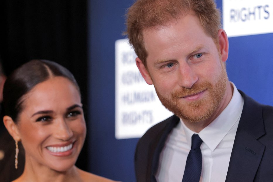 Fotografija: Harry in Meghan bosta povabljena na kronanje novega kralja. FOTO: Andrew Kelly, Reuters
