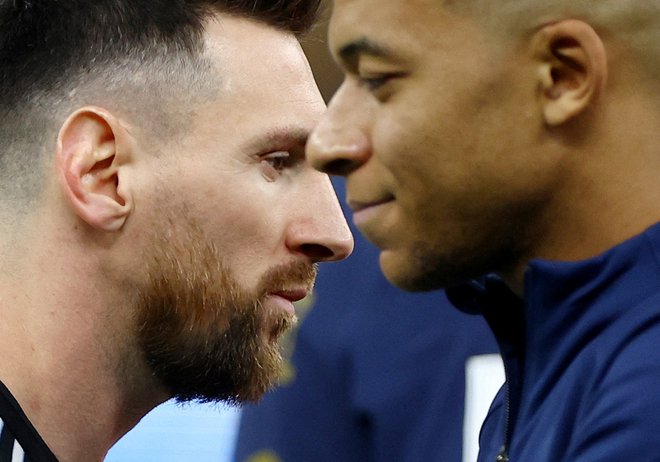 Kylian Mbappe in Lionel Messi. FOTO: Hannah Mckay, Reuters
