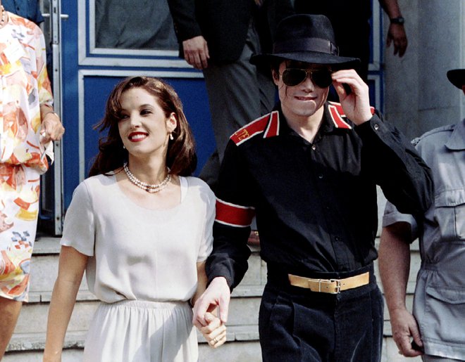 Poročena je bila tudi z Michaelom Jacksonom. Fotografija je bila posneta leta 1994. FOTO: Stringer, Reuters
