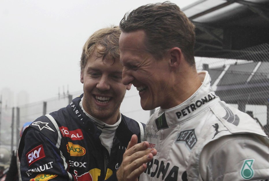 Fotografija: Michael Schumacher in Sebastian Vettel FOTO: Ricardo Moraes, Reuters
