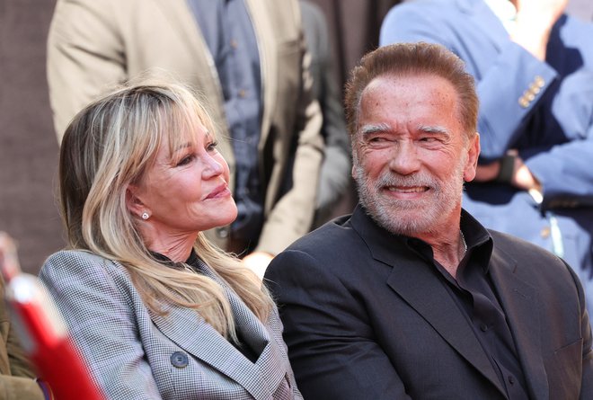 Arnold Schwarzenegger in Melanie Griffith. FOTO: Mario Anzuoni Reuters
