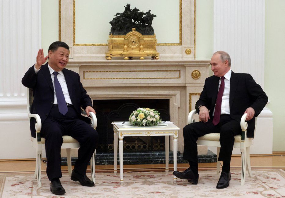 Fotografija: Putin in Ši Džinping na sestanku v Kremlju. FOTO: Sputnik Via Reuters
