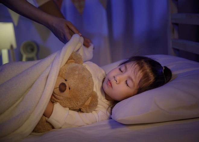Že najmlajše podučimo o pomenu kakovostnega spanca. FOTO: Getty Images/iStockphoto

