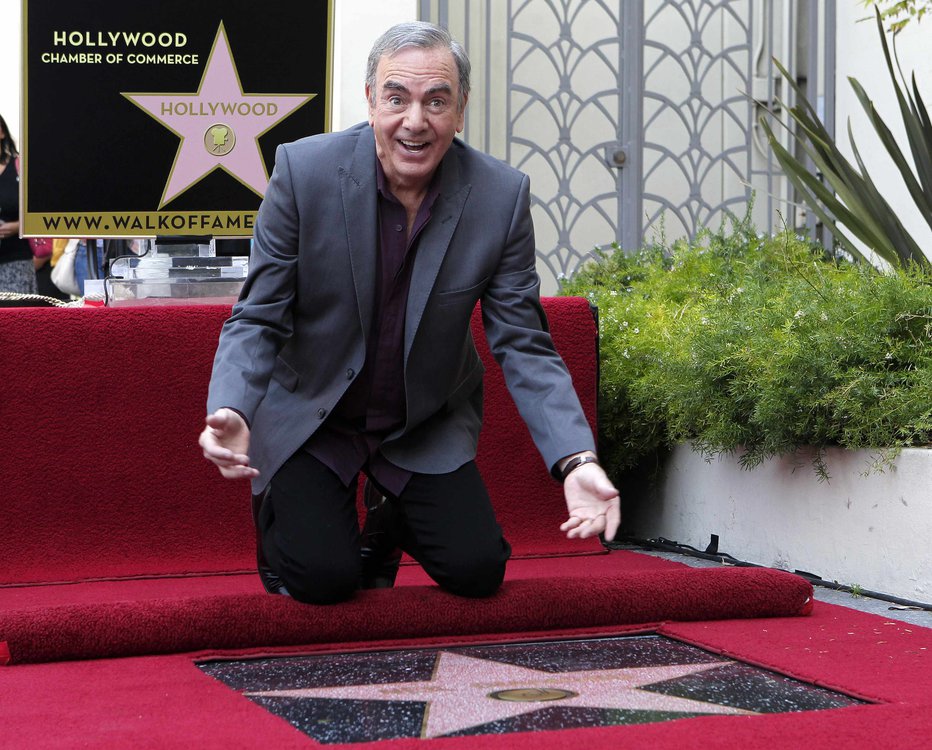 Fotografija: Leta 2012 je na hollywoodskem bulvarju slavnih zasijala njegova zvezda. FOTO: Mario Anzuoni/Reuters
