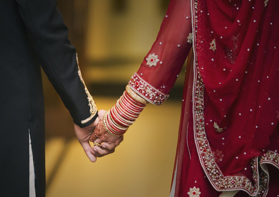 Fotografija: Na koncu so jima dovolili, da se poročita. FOTO: Ali Awais/Getty Images