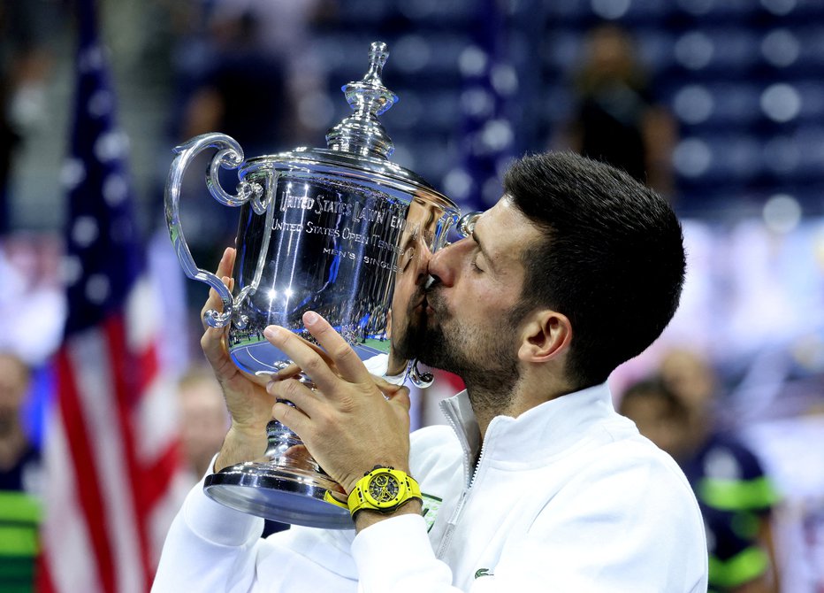Fotografija: Po zmagi v New Yorku so čustva prevzela tudi velikih zmag vajenega Novaka Đokovića. FOTO: Mike Segar, Reuters