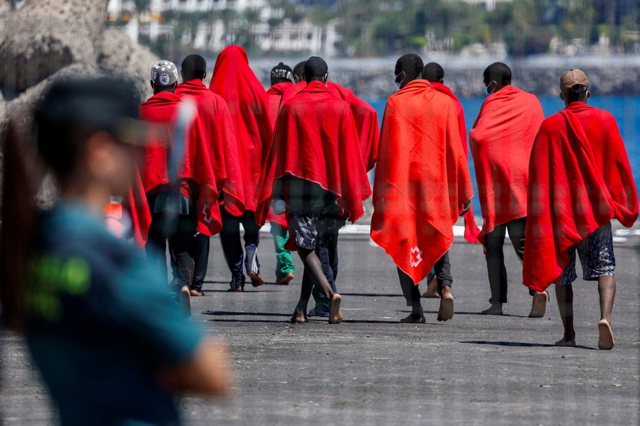 Fotografija: Migranti prihajajo v Evropo po boljše življenje. FOTO: Borja Suarez Reuters