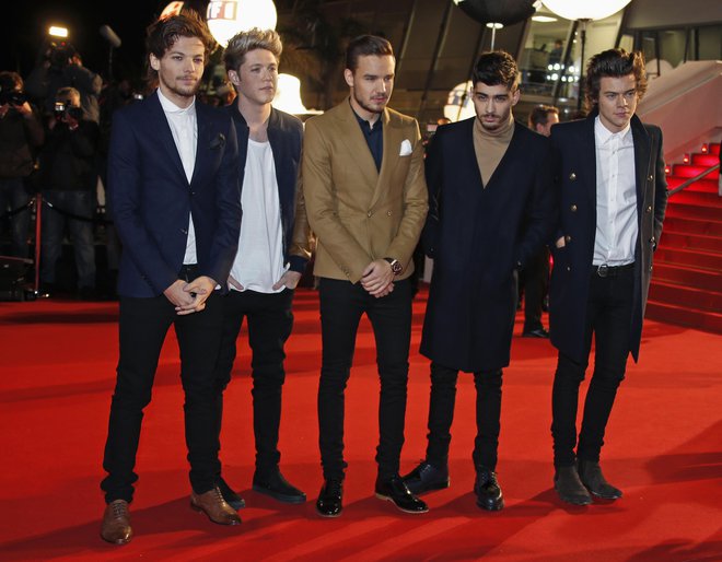 Zayn (drugi z desne) je bil nekoč član britanske glasbene senzacije One Direction. FOTO: Eric Gaillard/Reuters