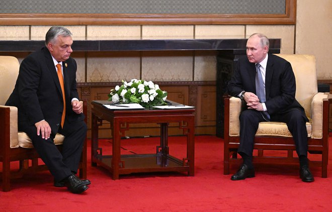 Vladimir Putin in Viktor Orban. FOTO: Sputnik Via Reuters
