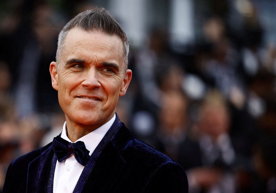 Fotografija: Robbie Williams je o svojem življenju posnel dokumentarno serijo. FOTO: Sarah Meyssonnier Reuters